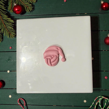 volleyball santa clay impression on tile with red ornaments