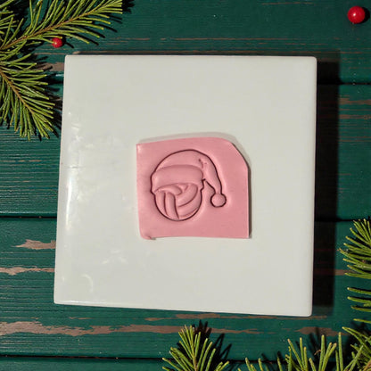 volleyball santa clay impression on white tile with greenery