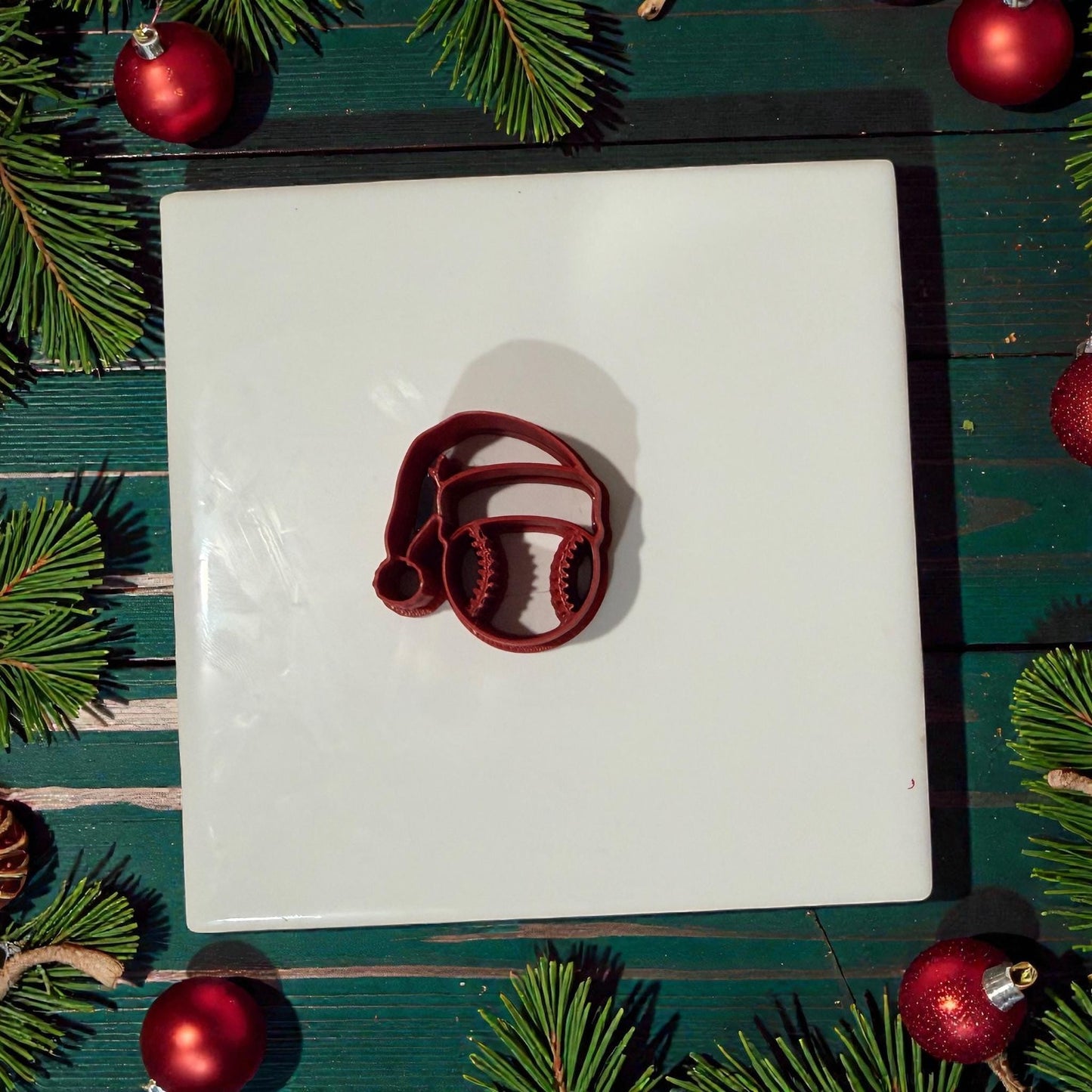 baseball santa hat polymer clay cutter on white tile