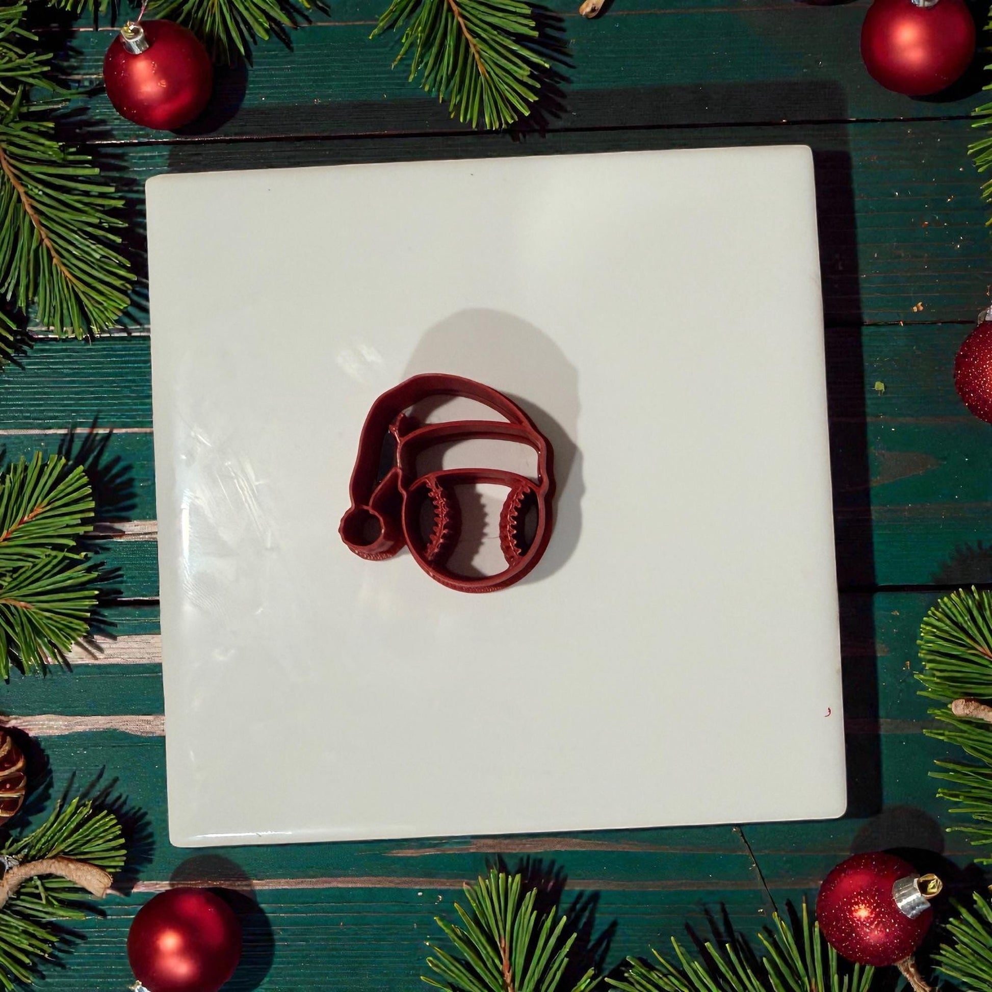 baseball santa hat polymer clay cutter on white tile