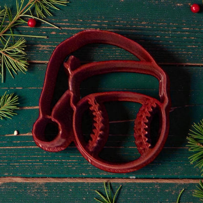 close up of baseball santa hat polymer clay cutter on green wooden table