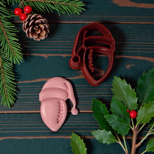 football santa clay shape and cutter on green wood