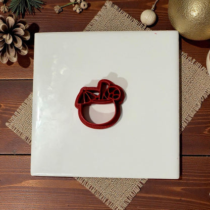 coconut tropical christmas drink cutter centered on white tile