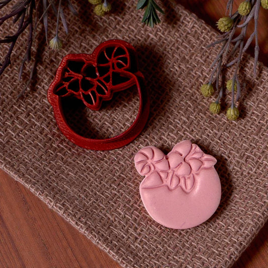 pink clay coconut drink impression on burlap and cutter side by side