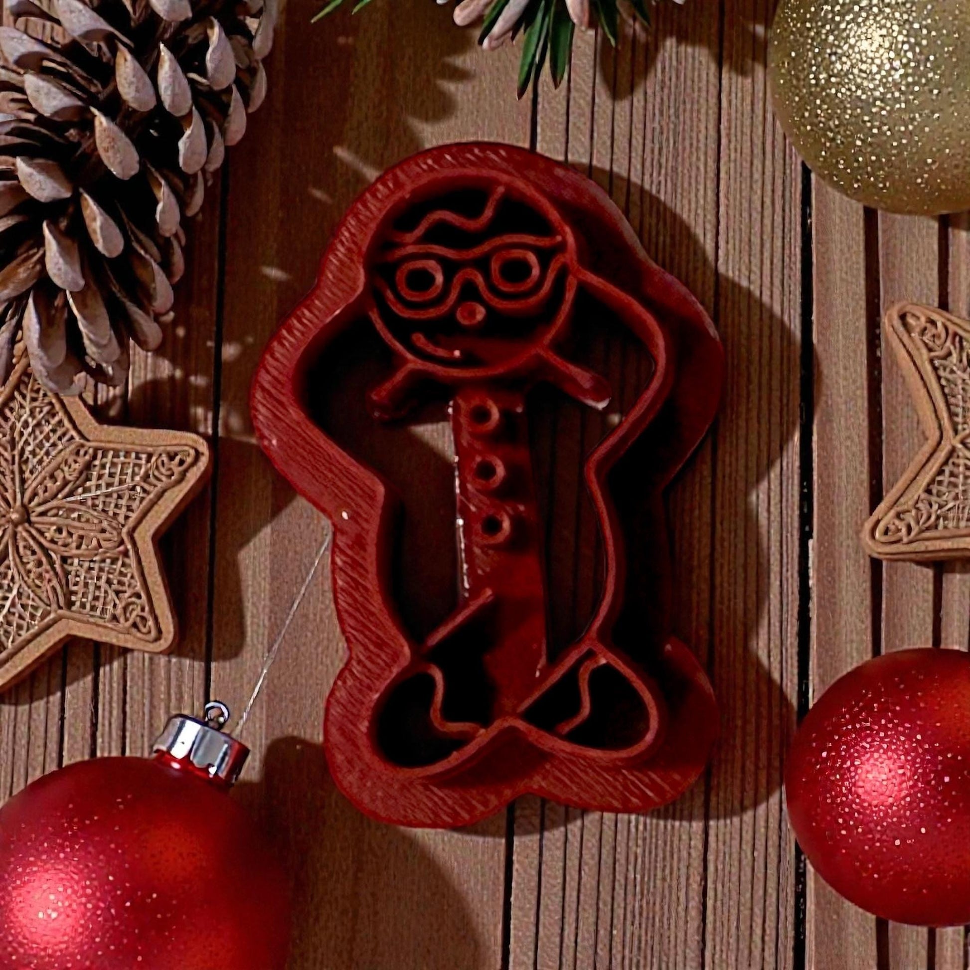 snowman polymer clay cutter on wood with holiday decor