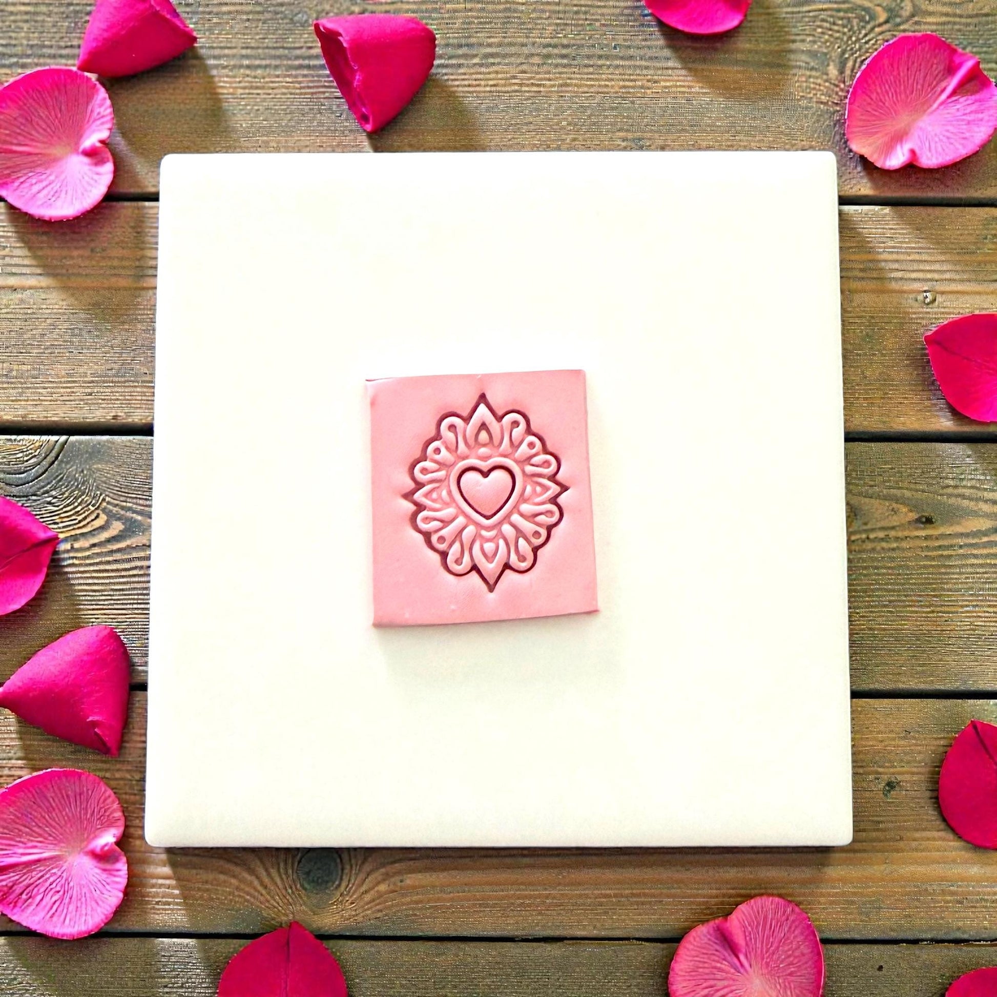 heart mandala clay impression on pink slab