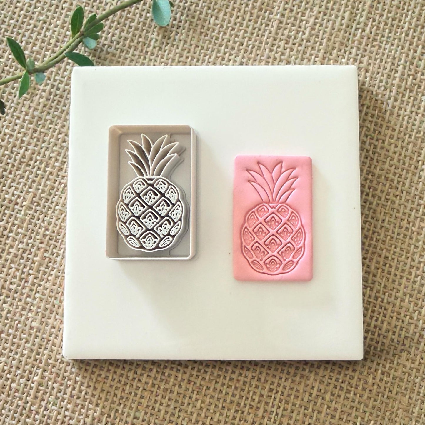 pineapple cutter and pink pineapple clay impression
