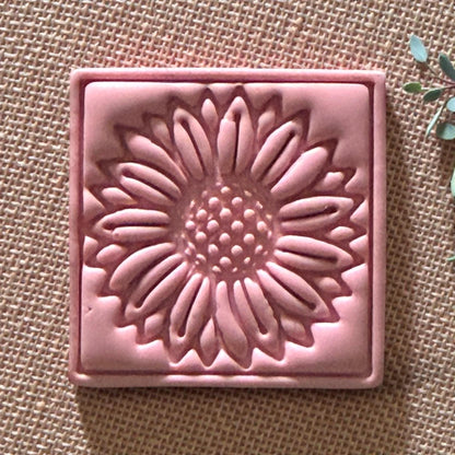 close-up of pink sunflower clay impression showing petal details