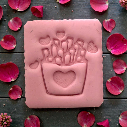 Pink clay impression of fries Valentine design with sprinkles and petals