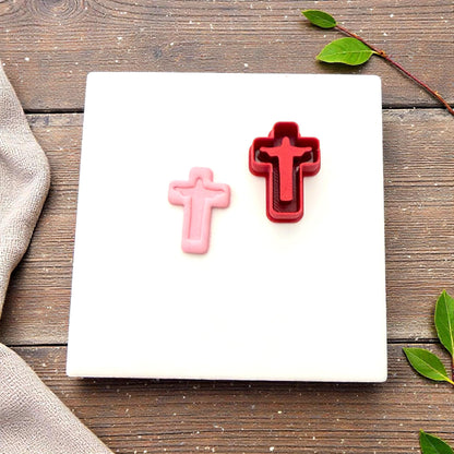 red cross cutter beside clay impression