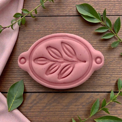 pink clay leaf bracelet connector close-up