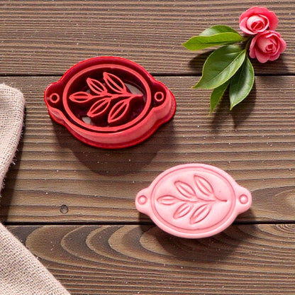 leaf bracelet connector cutter and clay piece on wood