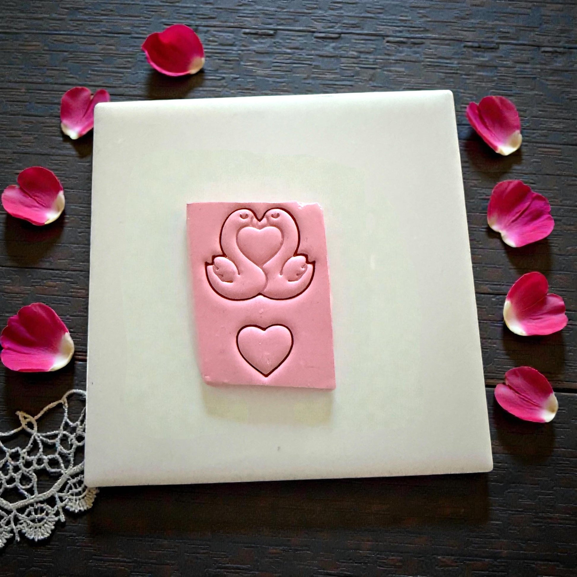 romantic heart swan clay impression on tile