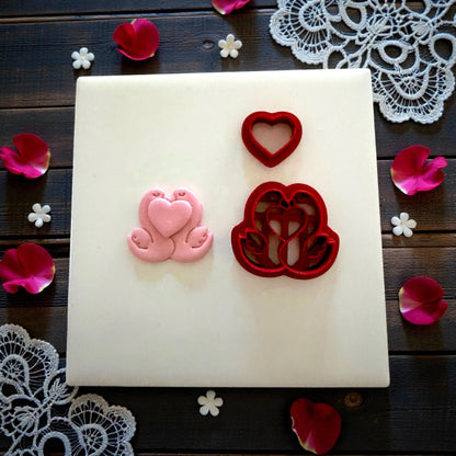romantic swan cutter and heart cutter displayed with petals
