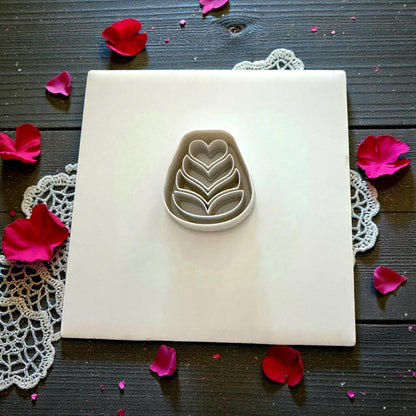 folk flower cutter set on white tile