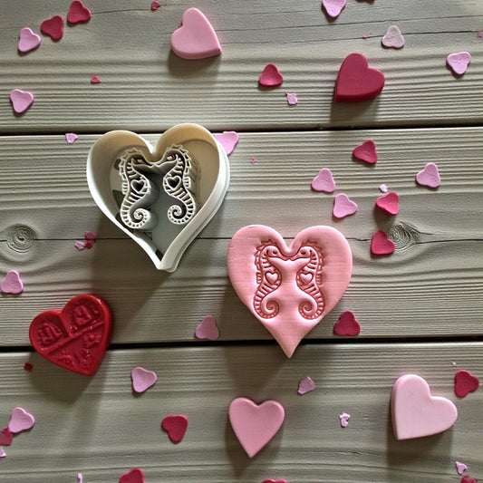 seahorse heart clay impressions with scattered hearts