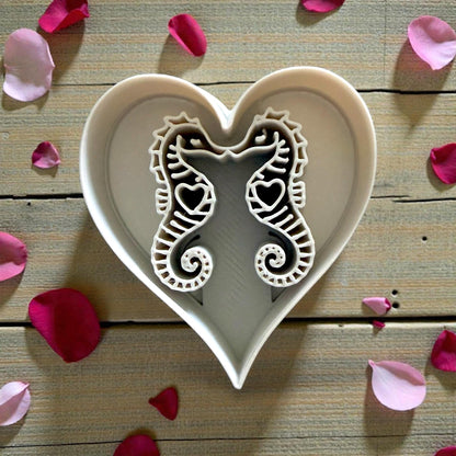 closeup of white seahorse heart cutter inside heart frame