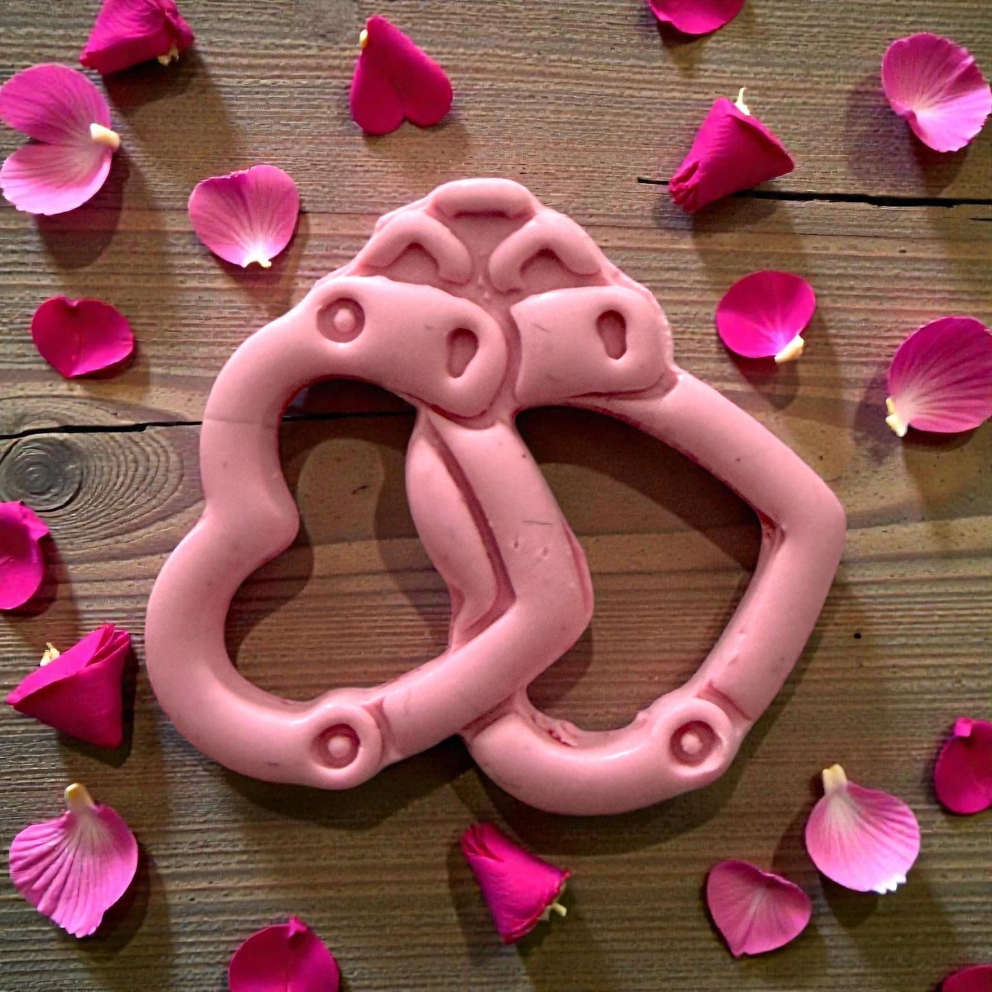 Close-up of heart handcuff clay shape