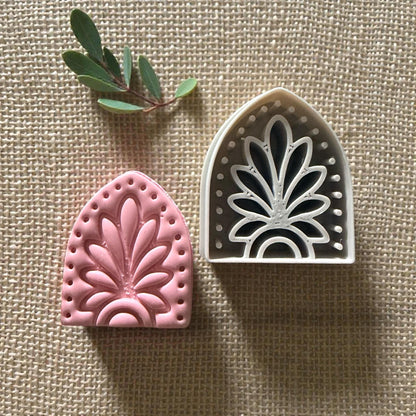 pink clay impression next to the boho arch cutter