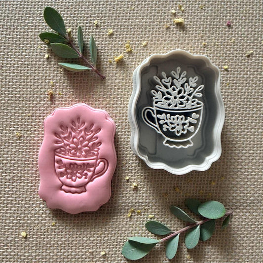 clay impression and teacup cutter side by side
