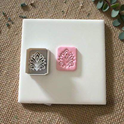 clay tile impression and cutter on ceramic tile