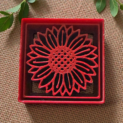 sunflower square polymer clay cutter in red frame on textured background