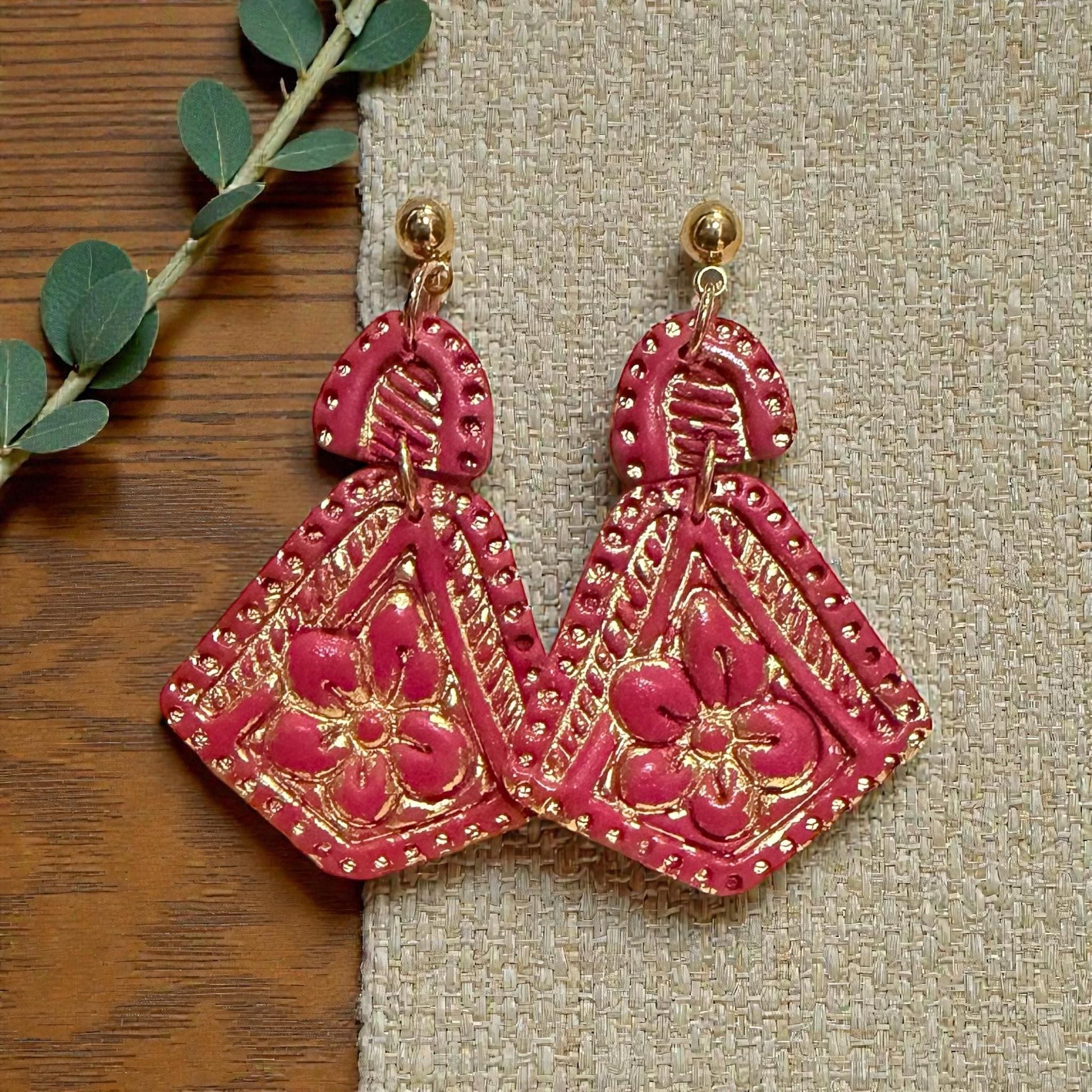 finished floral earrings with gold accents