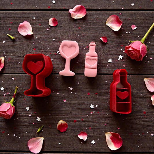 Wine glass and bottle cutter set with petals and roses on dark background