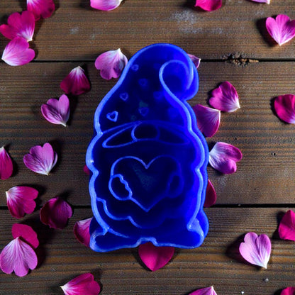 blue Valentine gnome cutter on wood with petals