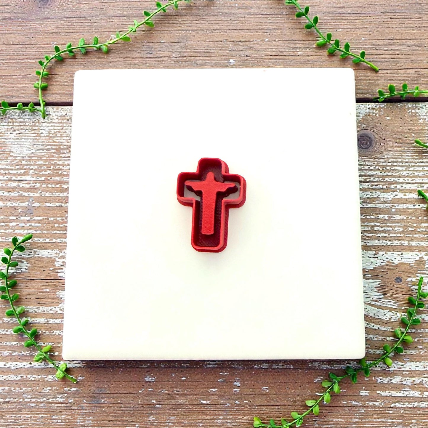 small Jesus cross cutter on tile