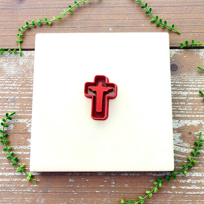 small Jesus cross cutter on tile