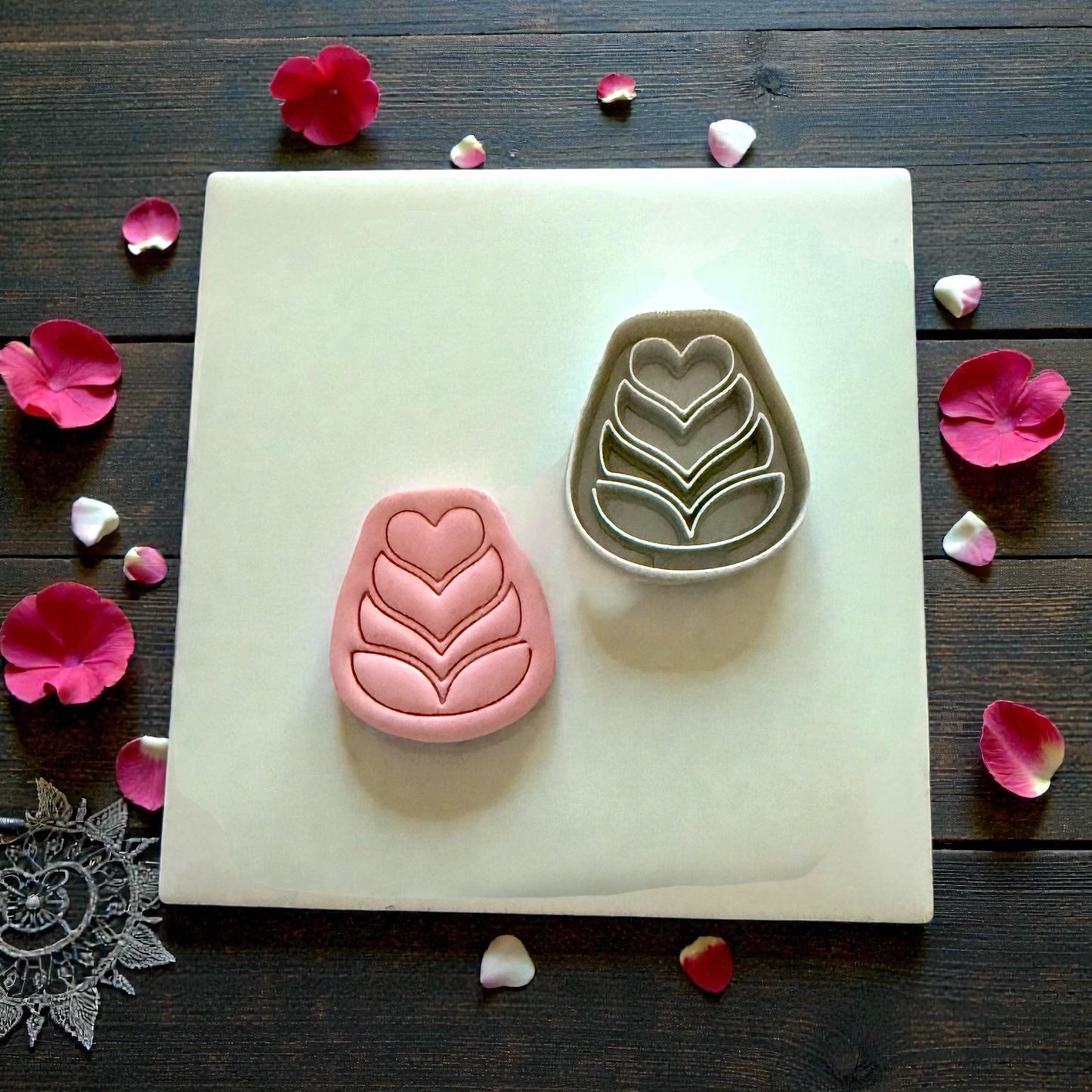 pink and gray folk flower cutters with heart detail