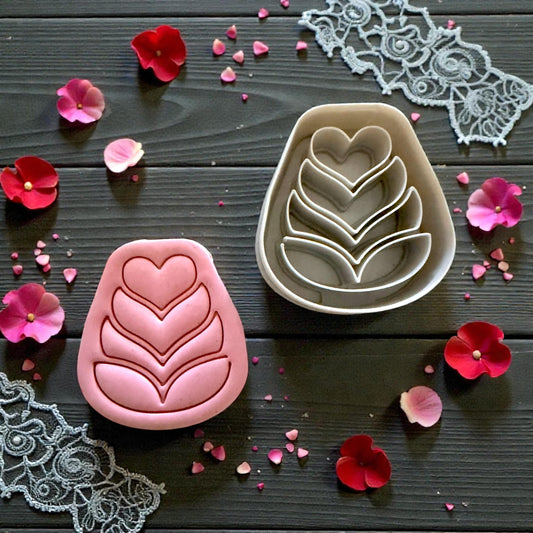 pink and gray folk flower cutters with heart detail