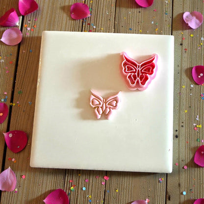 butterfly imprint with cutter beside it