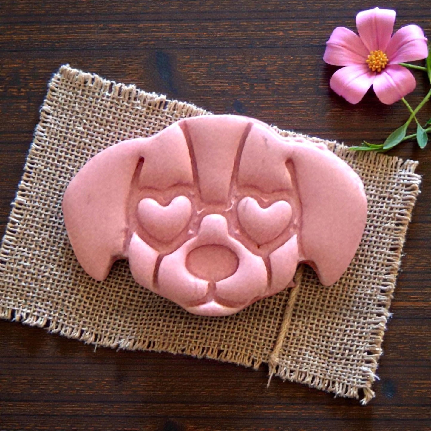 large puppy face clay impression on burlap