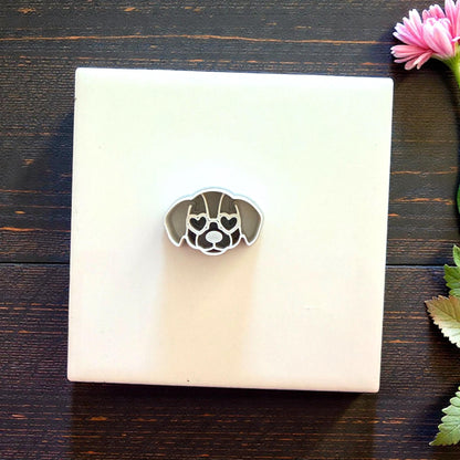puppy clay cutter displayed on white tile