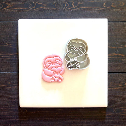 sloth imprint and cutter on white tile