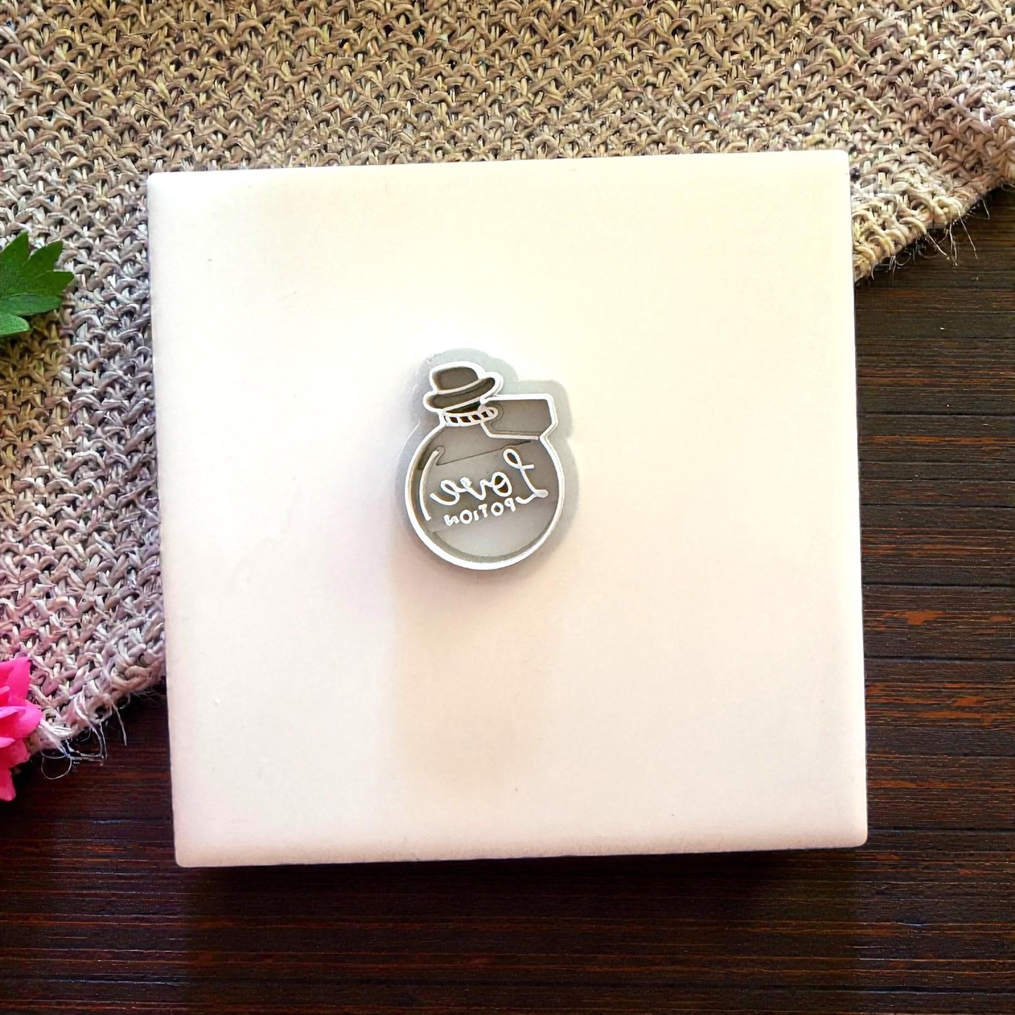 single love potion cutter centered on tile