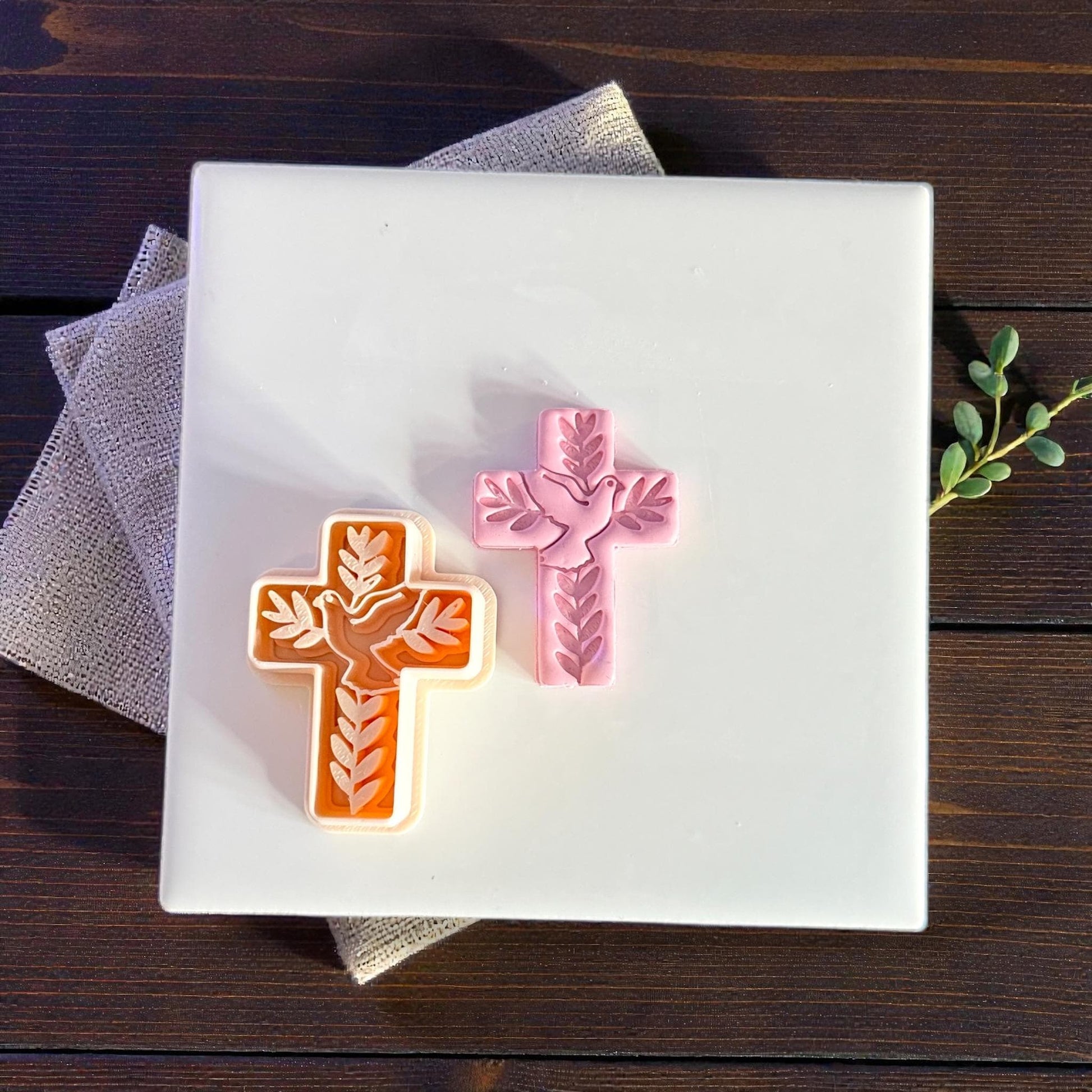 cross cutter and clay imprint shown side by side