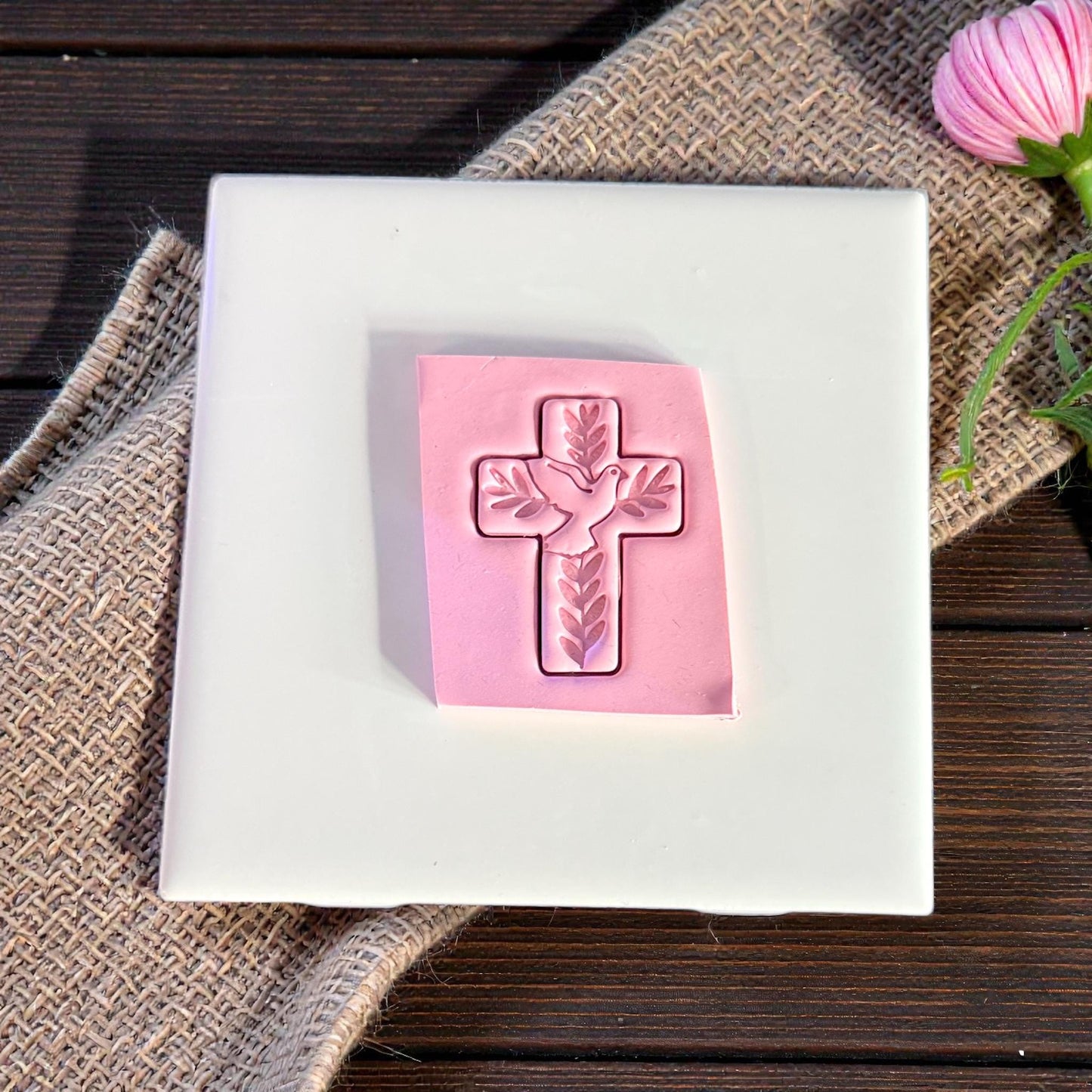 polymer clay cross imprint with dove and leaves