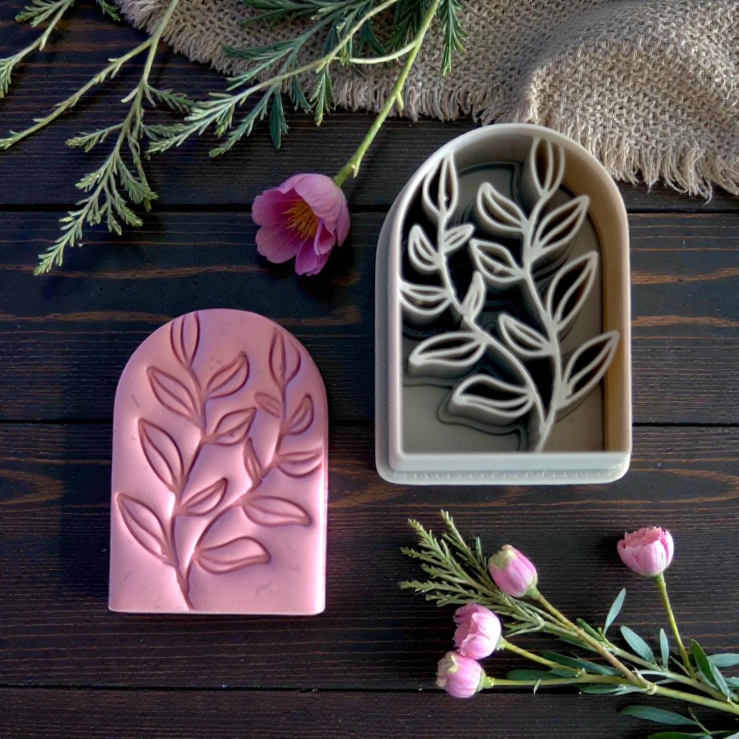 leaf arch cutter next to clay impression