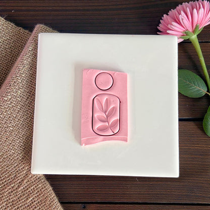 polymer clay leaf arch cutter impression on pink clay
