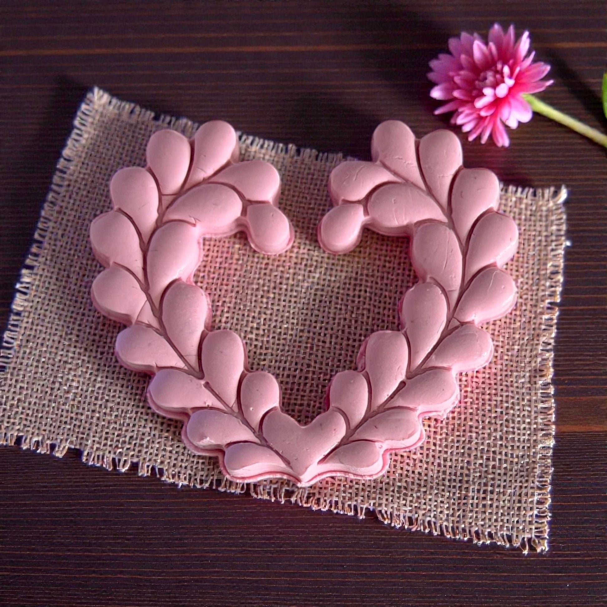 closeup of heart wreath clay piece with layered leaves