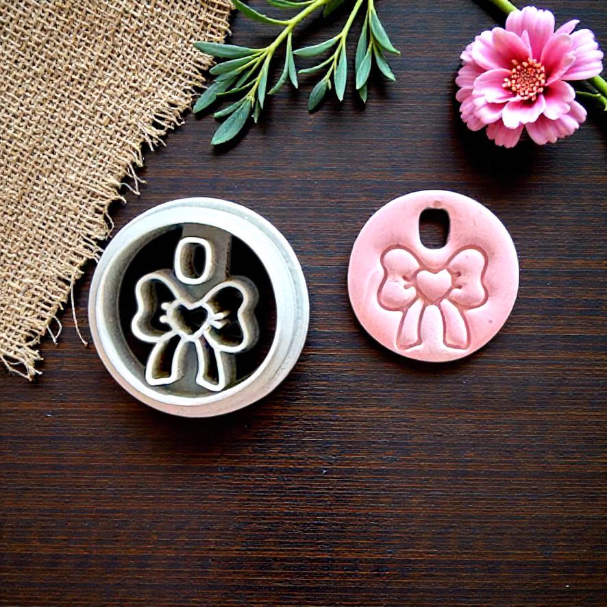 heart bow round cutter and clay impression