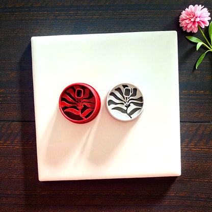 red and pink matisse flower cutters displayed together