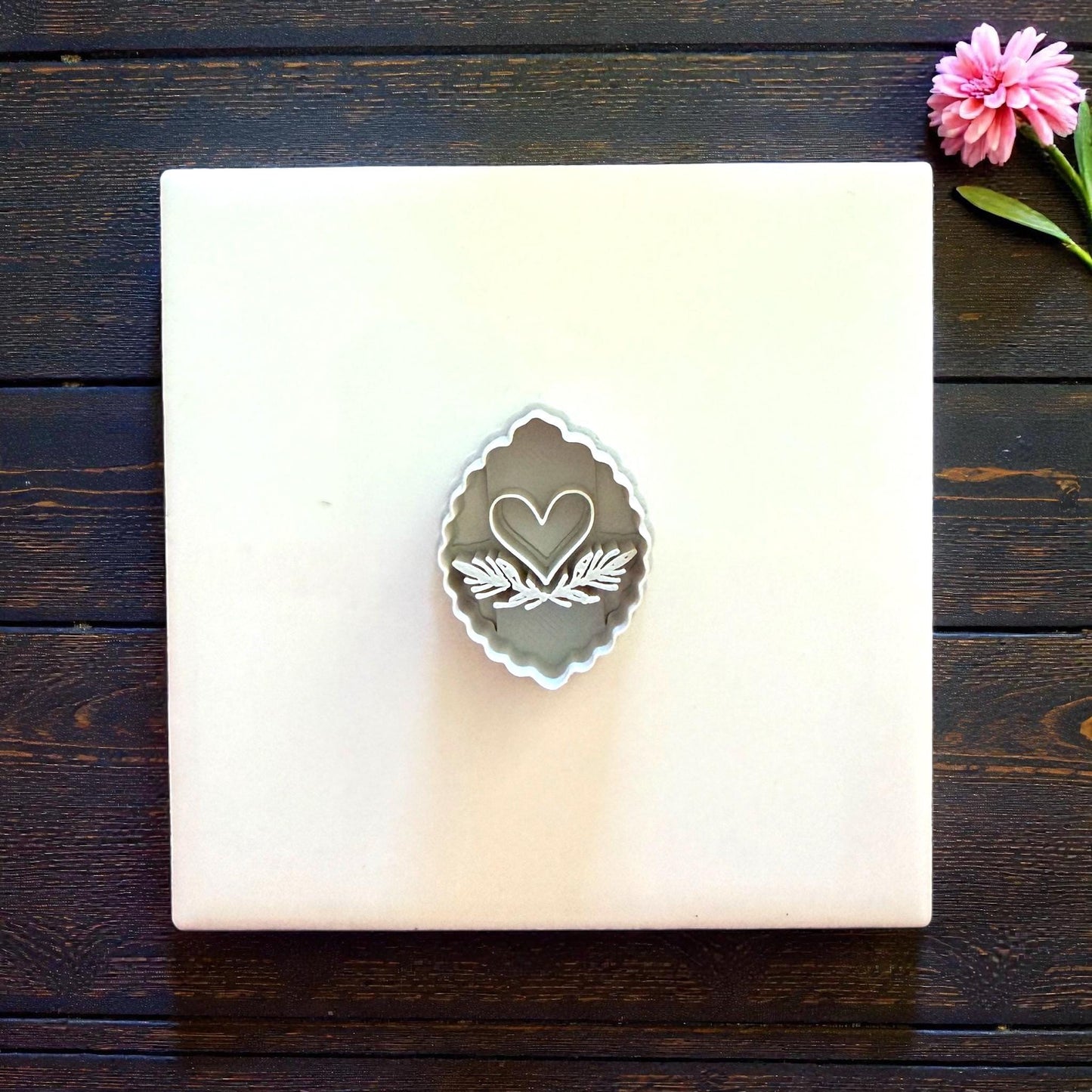 single scalloped heart cutter on tile