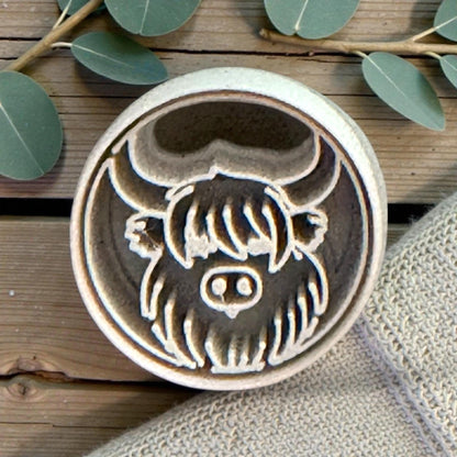 close up of highland cow clay cutter