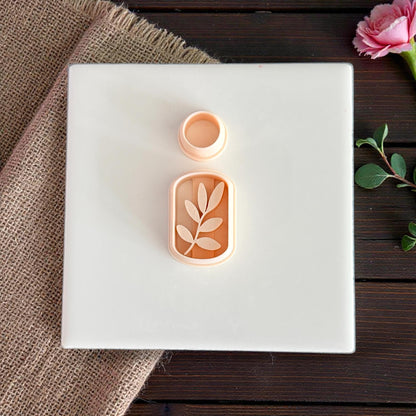 arch leaf clay cutter with circle topper on tile