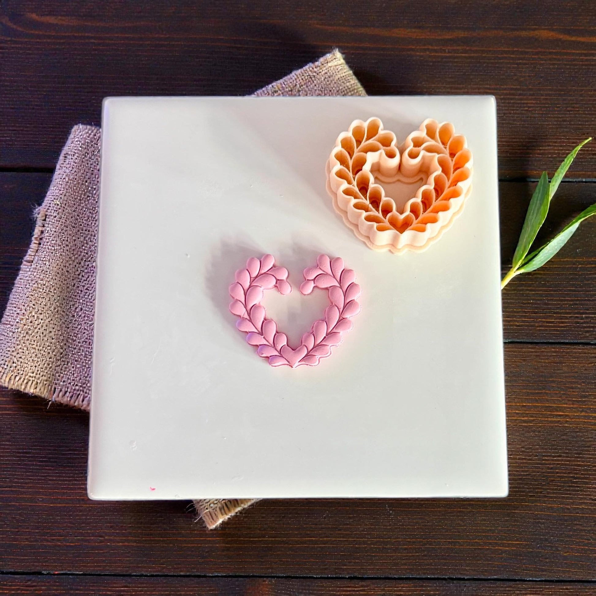 heart wreath clay shape and cutter on tile