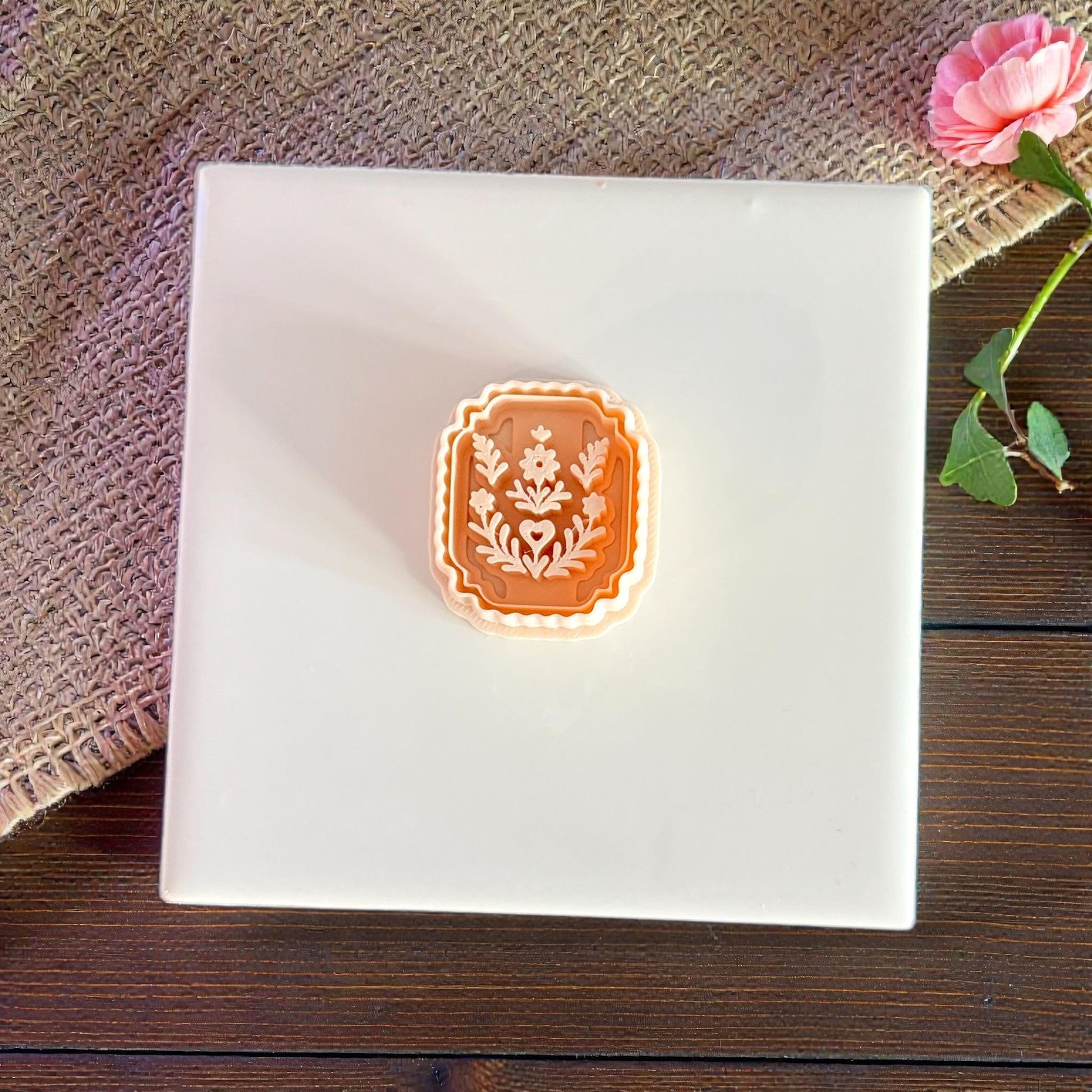 stacked plaque cutter set showing floral design inside frame